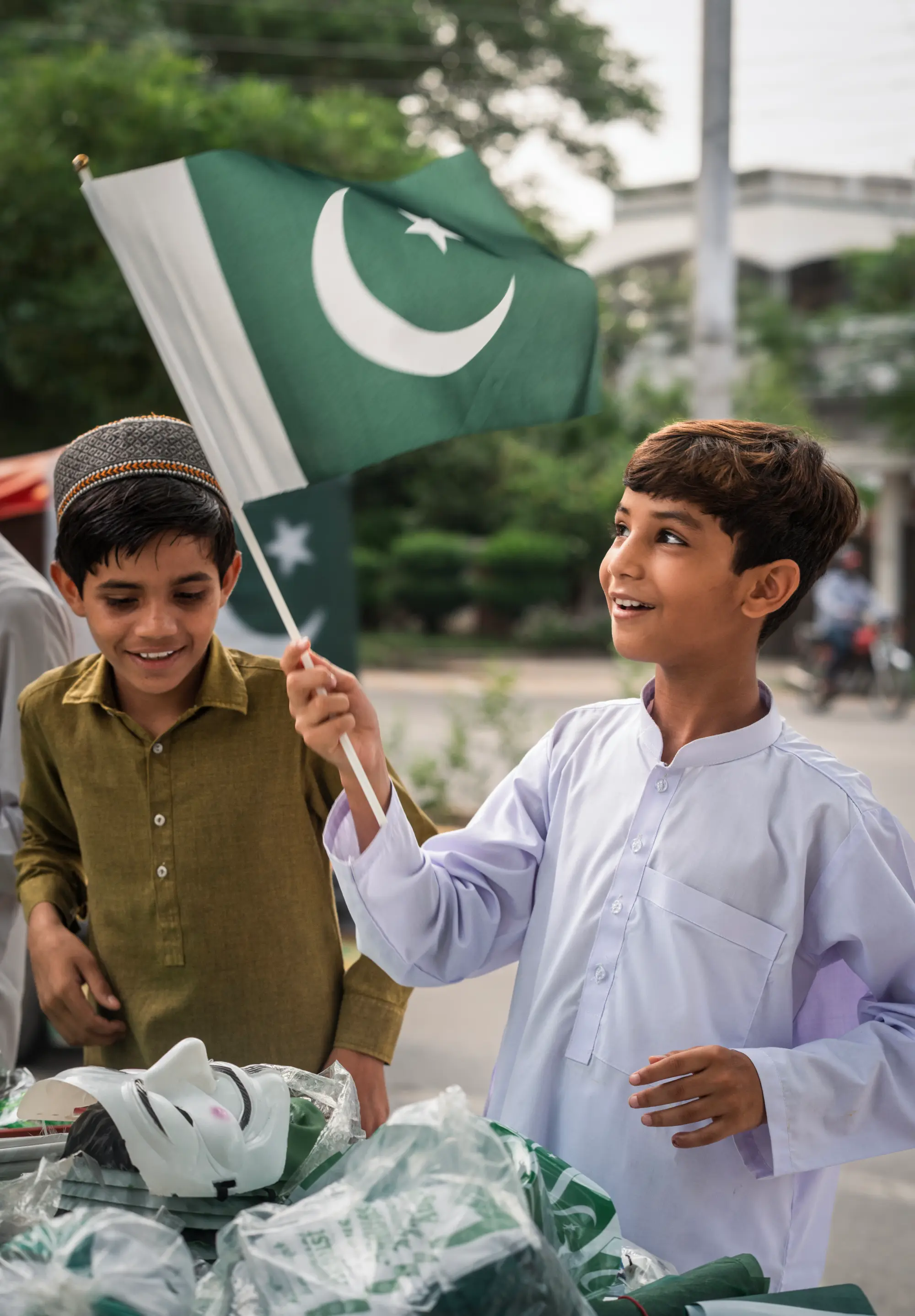 Children checking out Independence Day stalls in Model Town C Block, Lahore