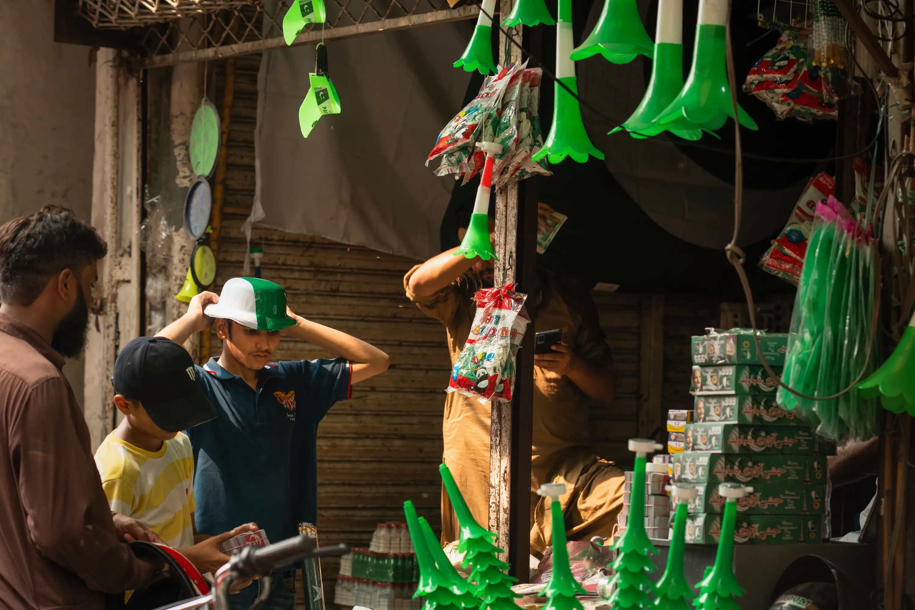 Customers trying out various celebratory paraphernalia