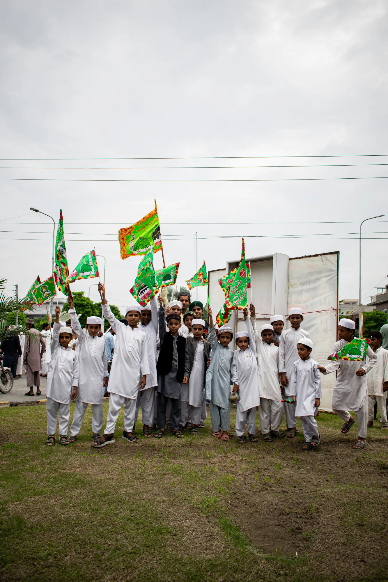 Madrassa children gather and pose for the camera during the procession